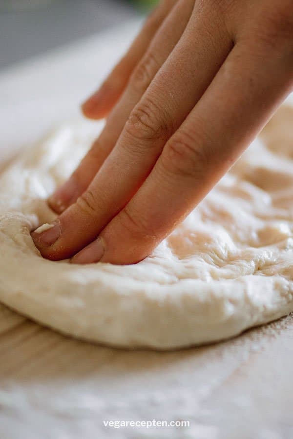 Roll out pizza dough