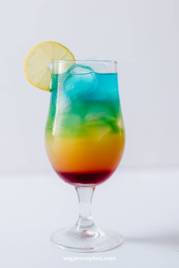 Rainbow paradise cocktail with rum